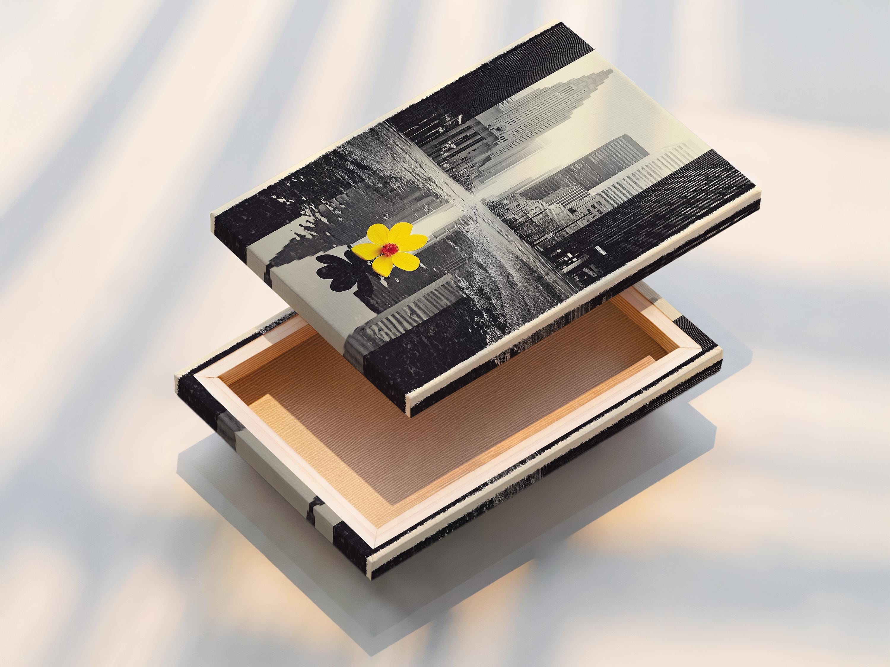 A monochrome city skyline is overlaid with a single bright yellow flower, reflected in water-like bands, creating a high-contrast urban accent detail