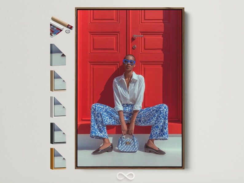 Seated fashion portrait with blue glasses in front of a red door backdrop