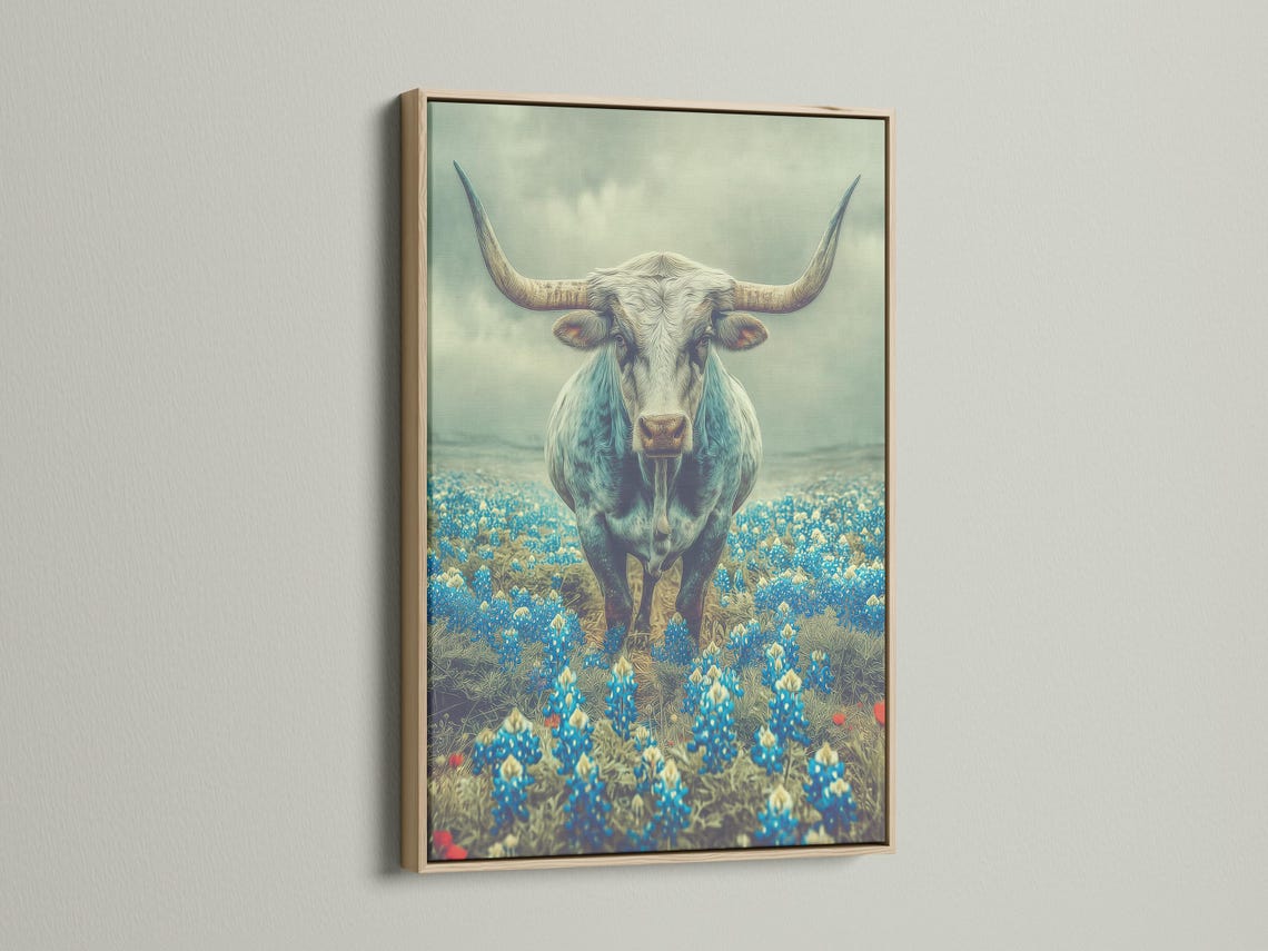 Longhorn bull standing in a blue flower field with a pale green-blue sky detail view