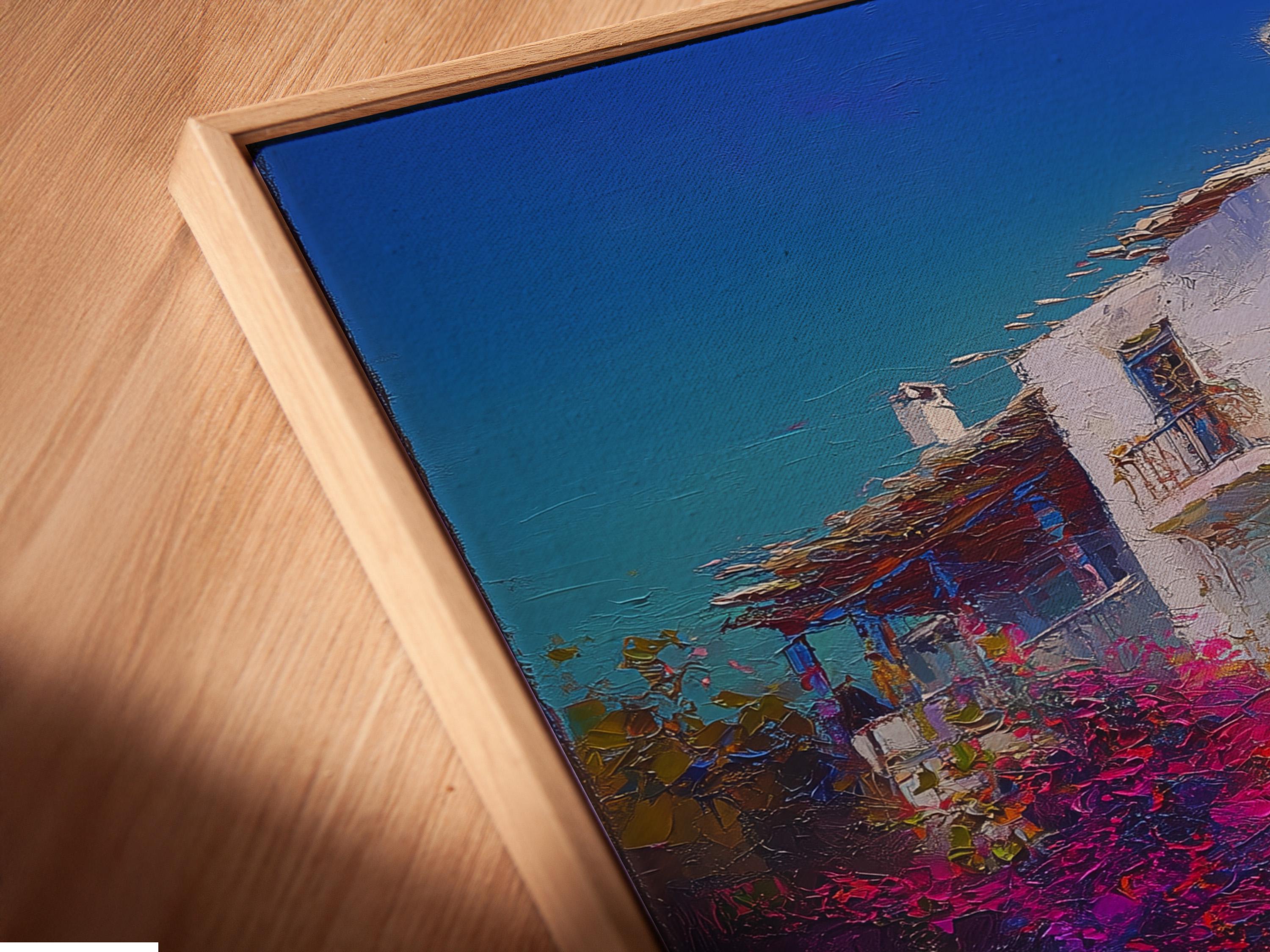 Painterly blue sky coastal buildings with whitewashed walls and vivid magenta vegetation detail view