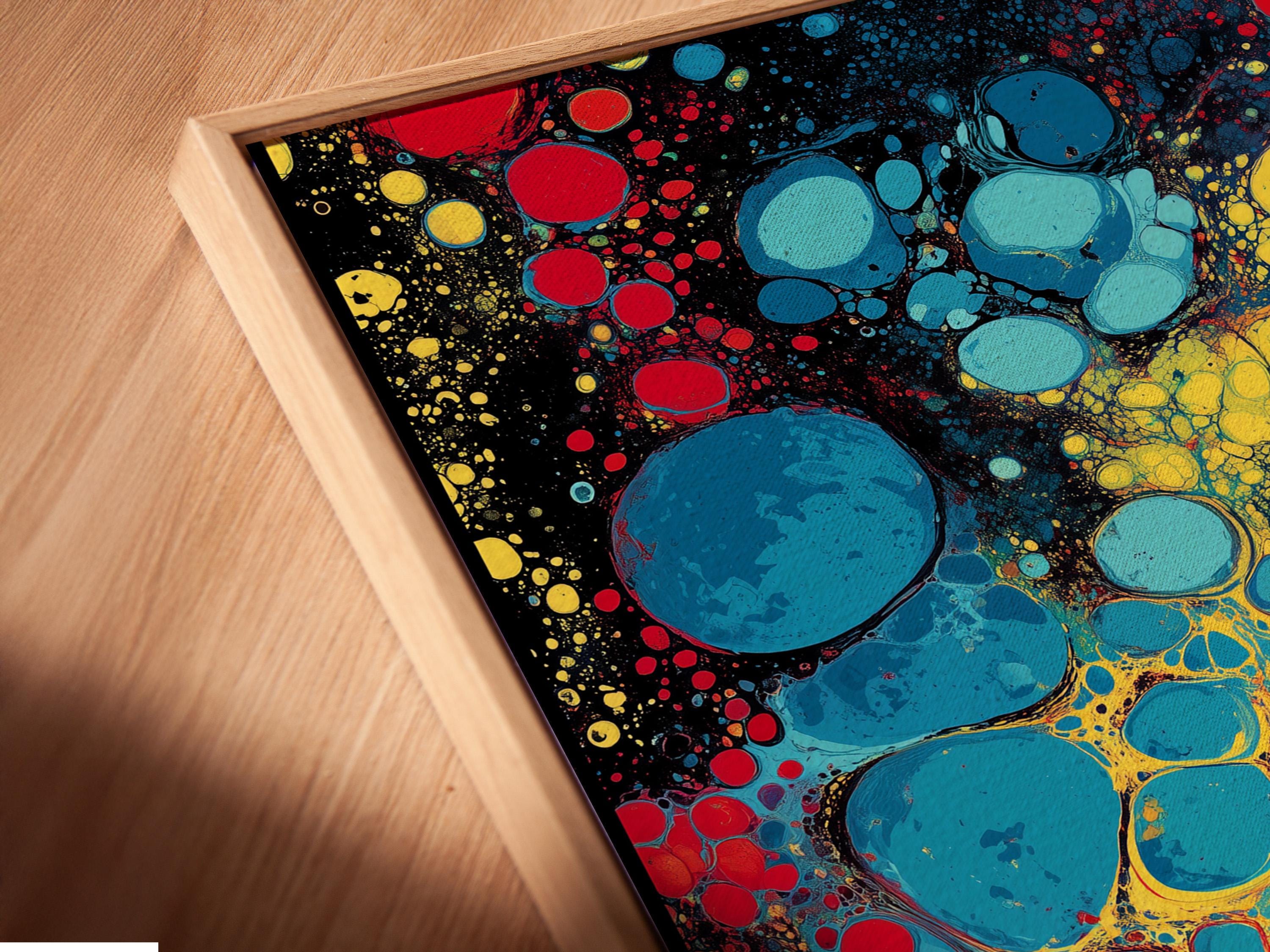 Fluid abstract artwork with red, blue and yellow bubble-like circles on a dark background detail view