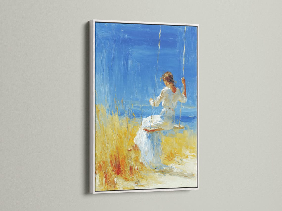 Framed artwork featuring a woman on a swing against a bright blue sky, with yellow grass
