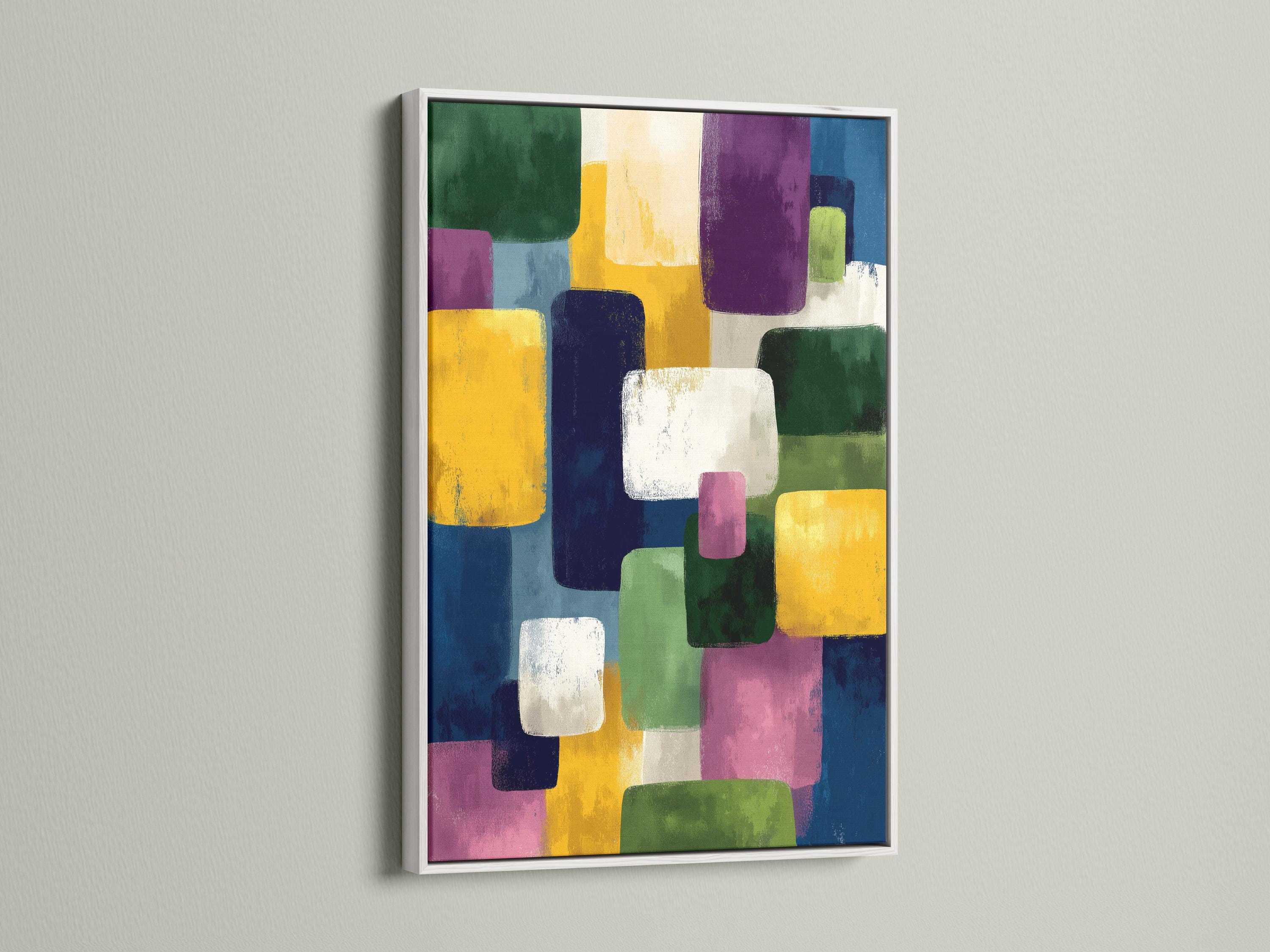 A framed geometric abstract artwork features overlapping colourful blocks—green, yellow, purple, blue and white—arranged in an irregular, layered