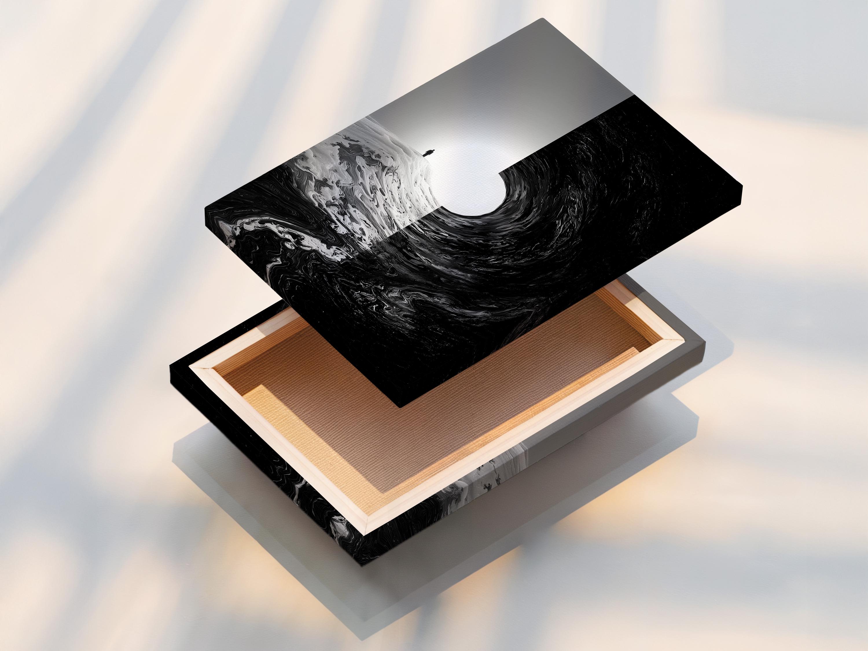 Room mockup showing monochrome framed artwork with a small standing figure and swirling black area