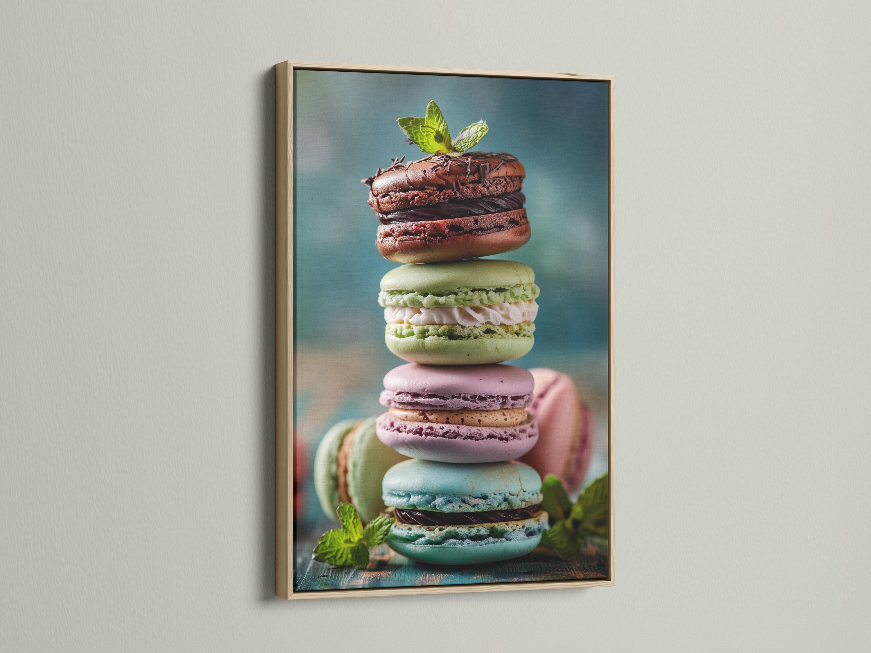 Close-up artwork of pastel macarons with mint leaves on a muted blue background