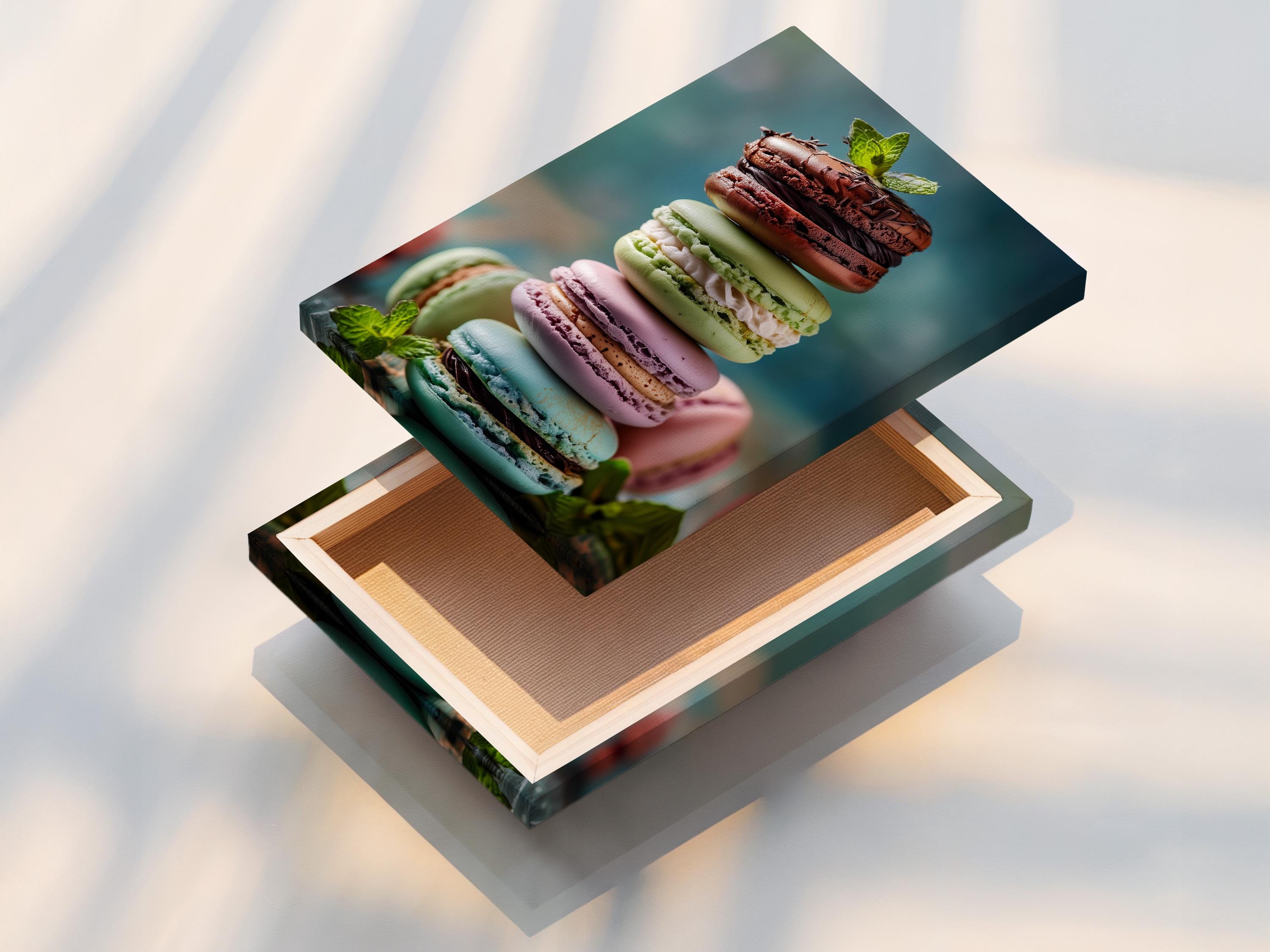 Close-up artwork of pastel macarons with mint leaves on a muted blue background