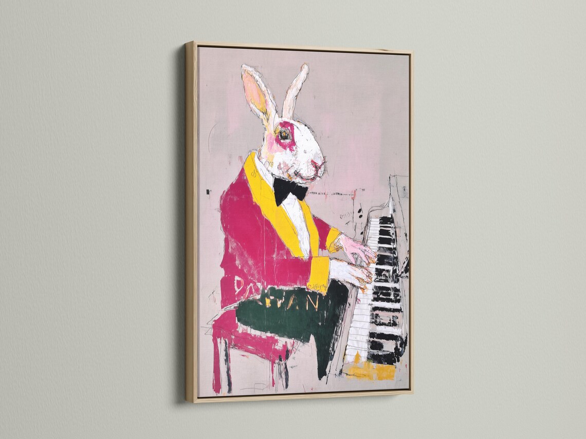 Rabbit playing piano with magenta and yellow jacket on a blush pink background detail view