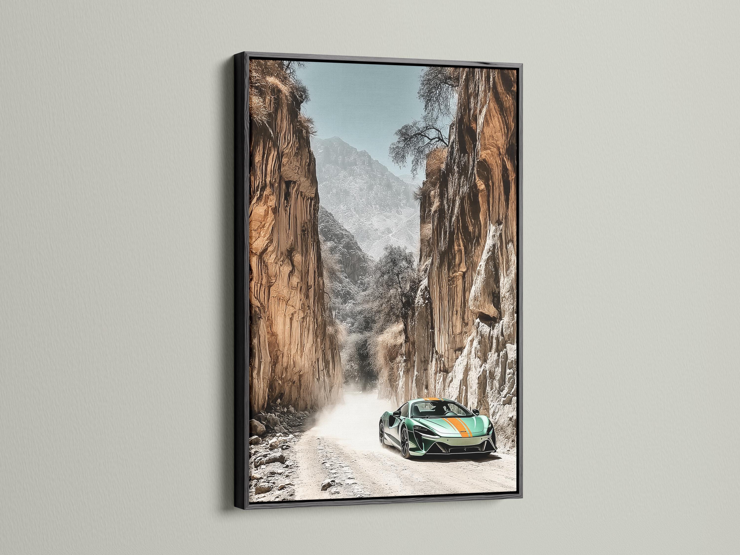 Green sports car on a sandy path in a rocky desert canyon with misty mountains detail view