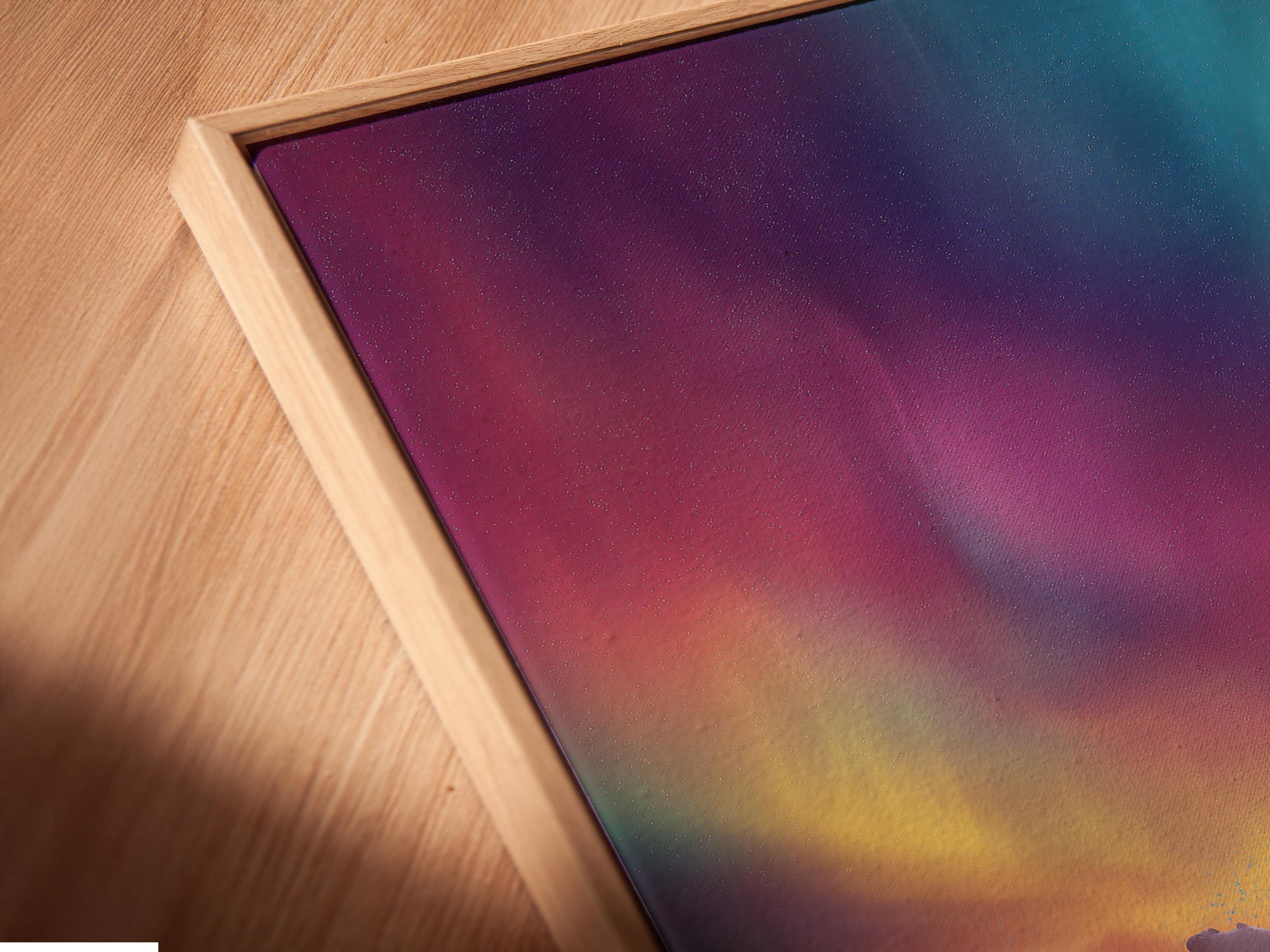 A leaping whale over reflective dark water beneath a pastel aurora sky detail view