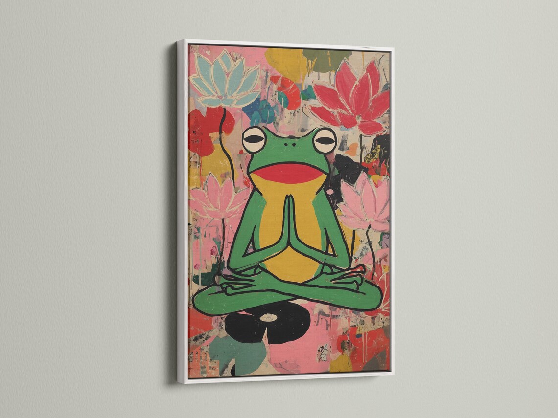 Stylised green frog meditating with pink lotus flowers in a colourful collage background detail view