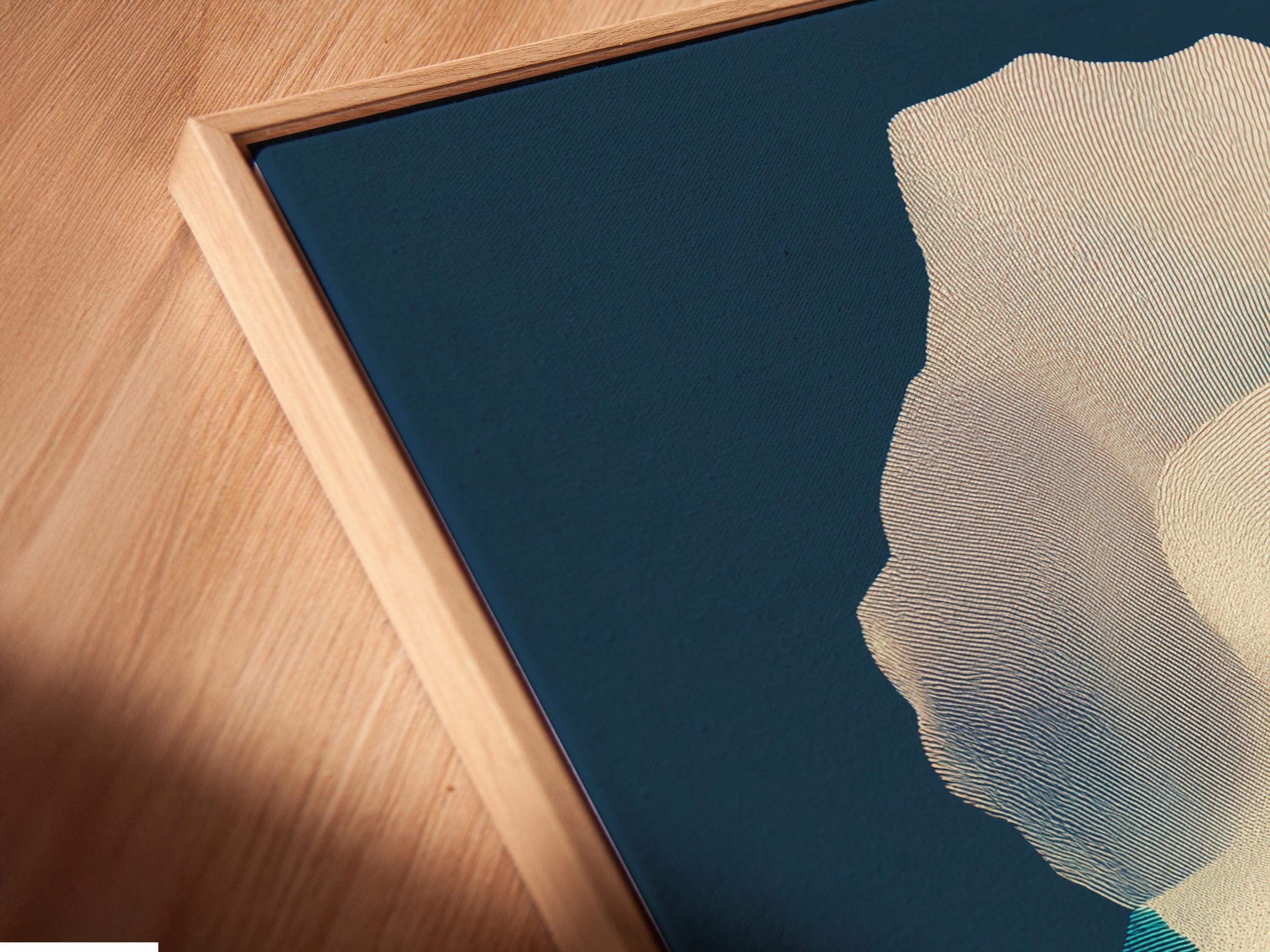 Room mockup showing navy blue abstract artwork on a wall with several frame options nearby