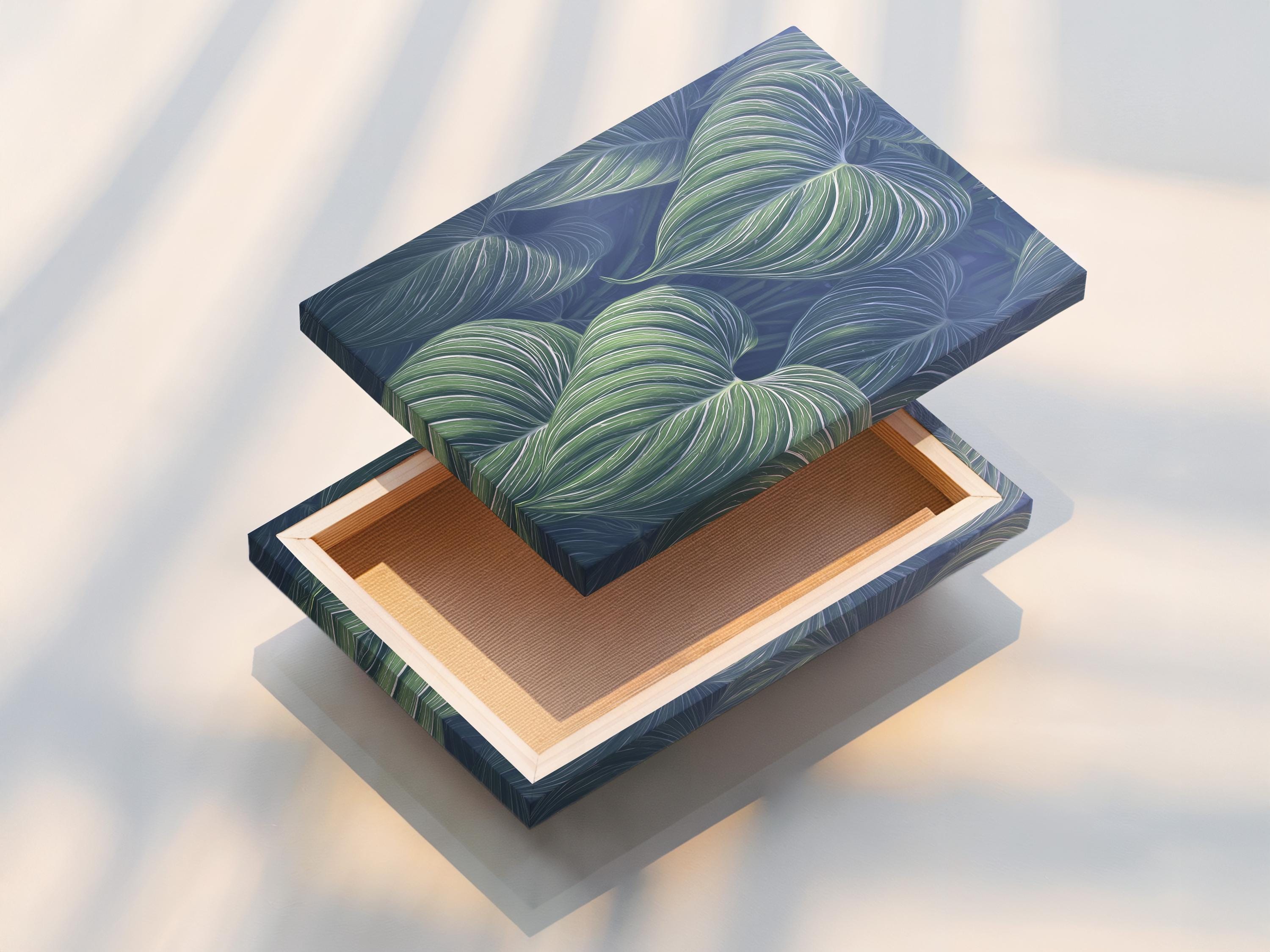 Mockup showing a framed botanical leaf artwork with mint green leaves on a navy-blue background