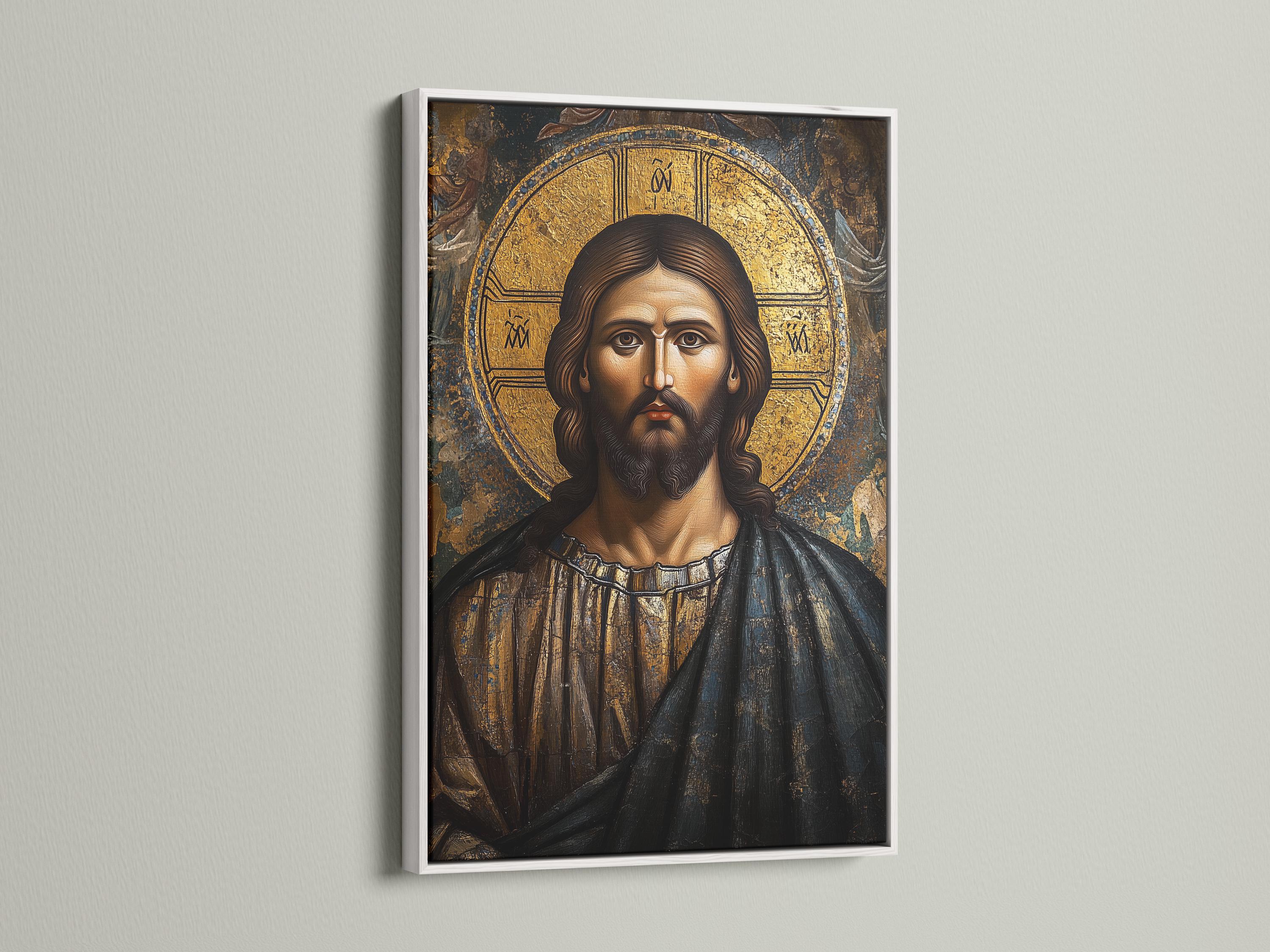 Byzantine-style portrait of Jesus Christ with a gold halo and textured dark background detail view