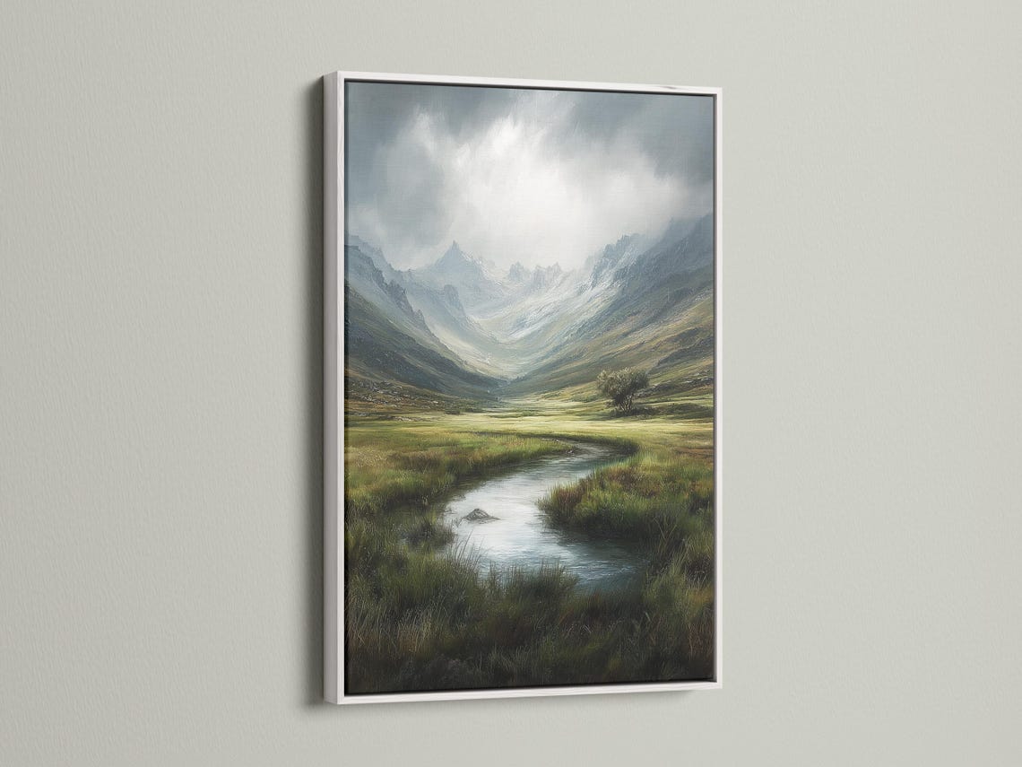 Room mockup showing framed mountain valley landscape artwork