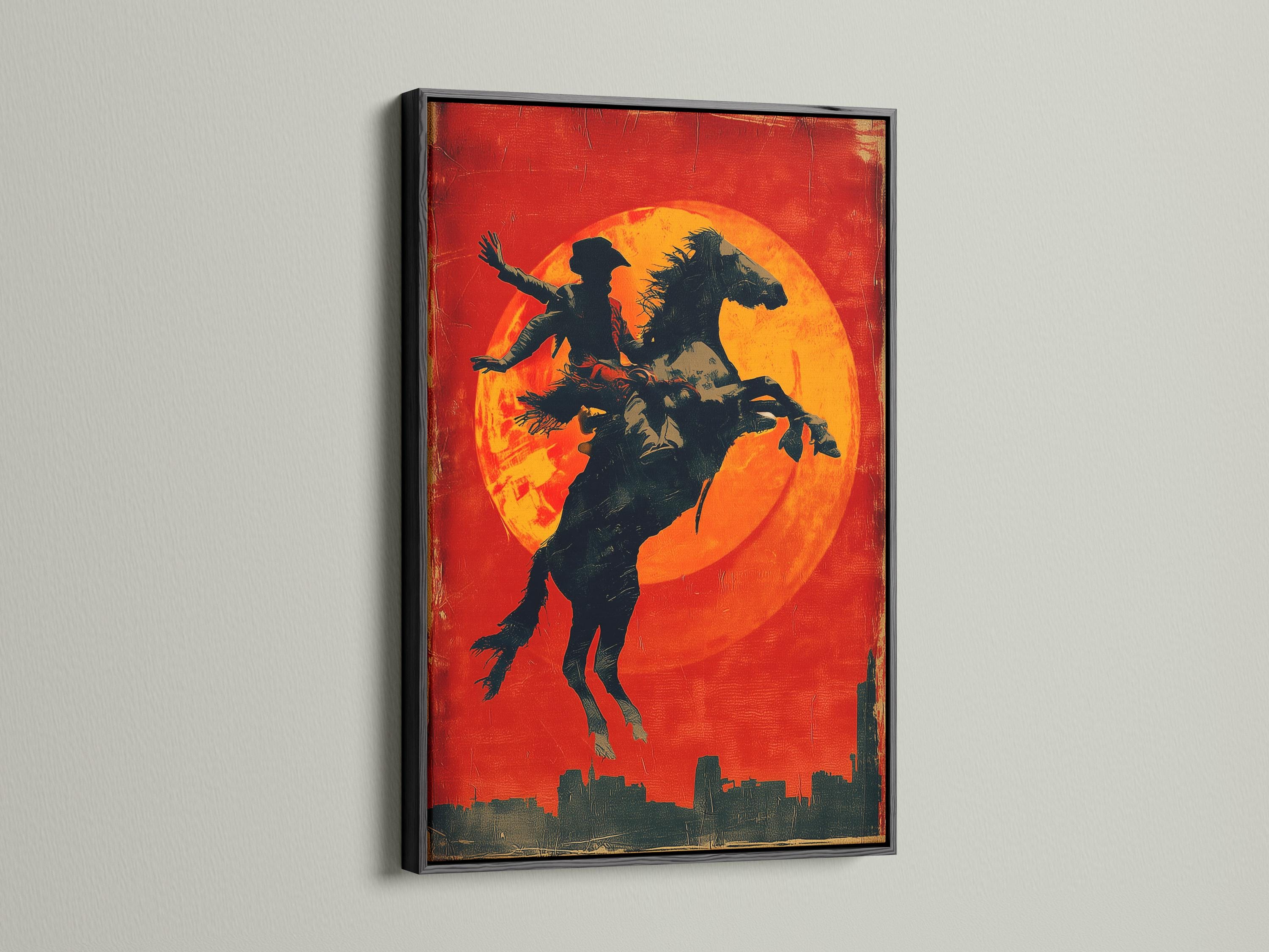 Silhouette of a cowboy riding a horse against a glowing orange sun on a red textured background detail view