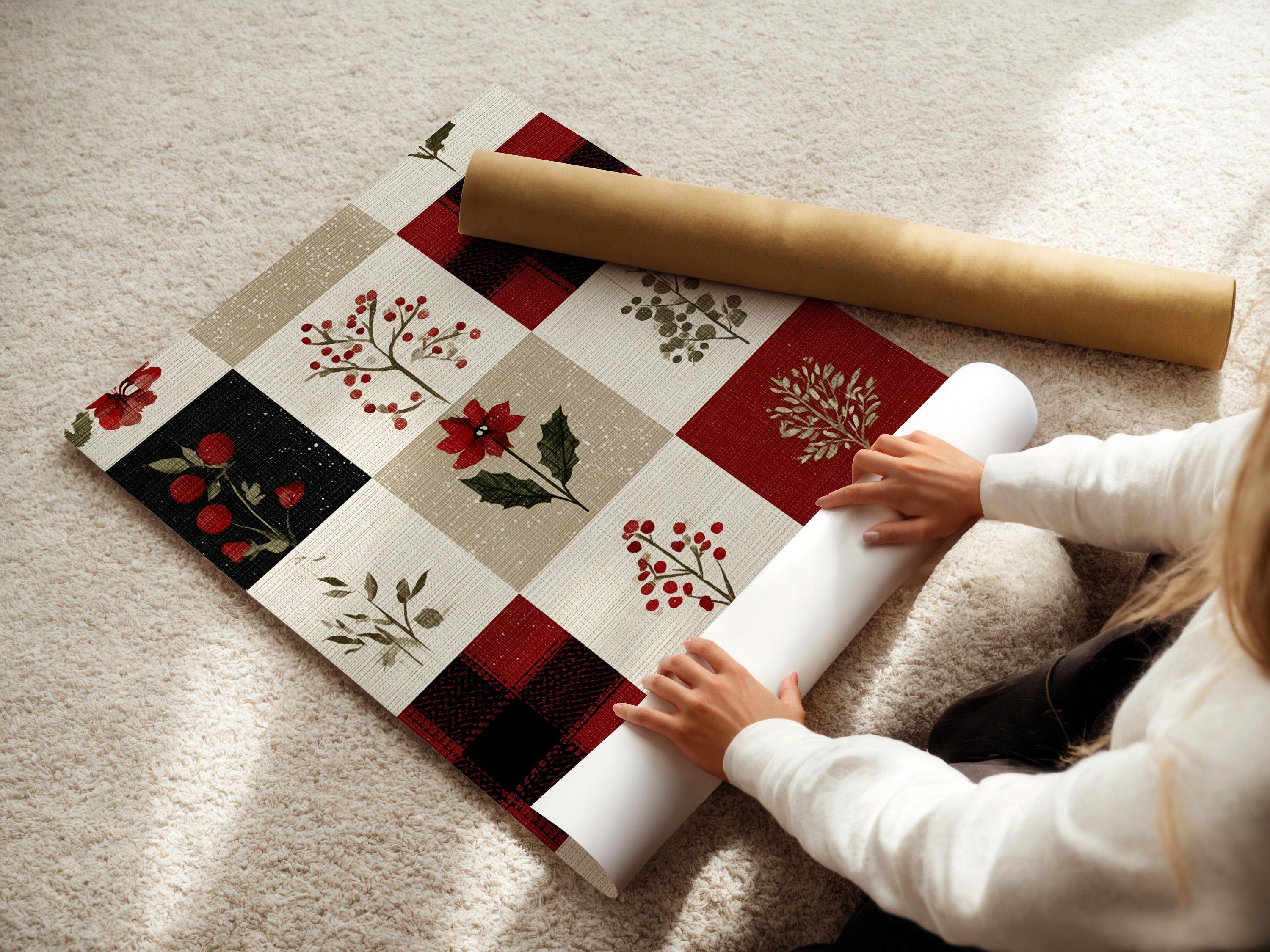 Patchwork floral artwork with red flowers and berries on cream, beige, and dark blocks detail view
