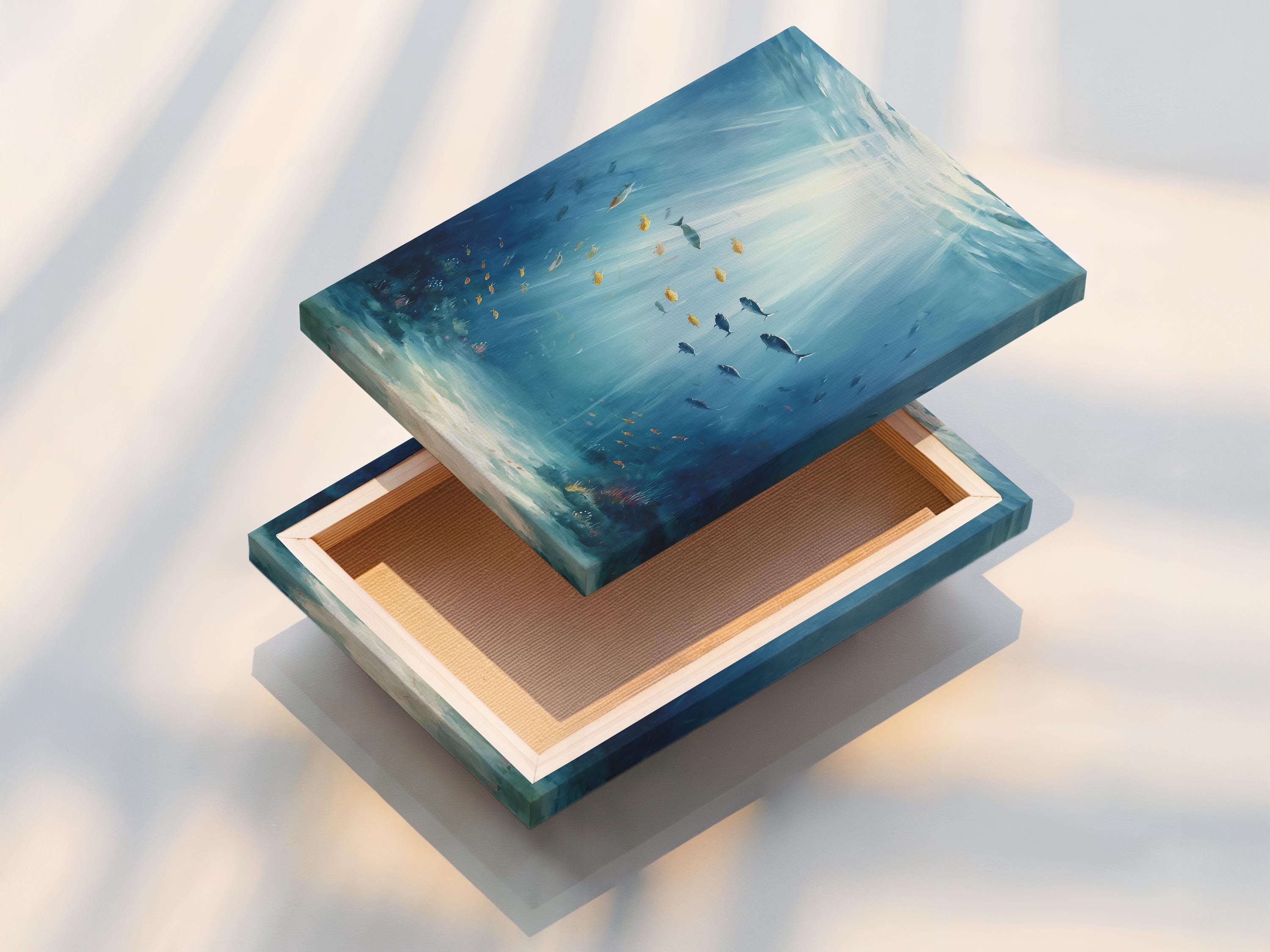 Bathroom wall mockup showing framed underwater fish artwork in aqua and blue