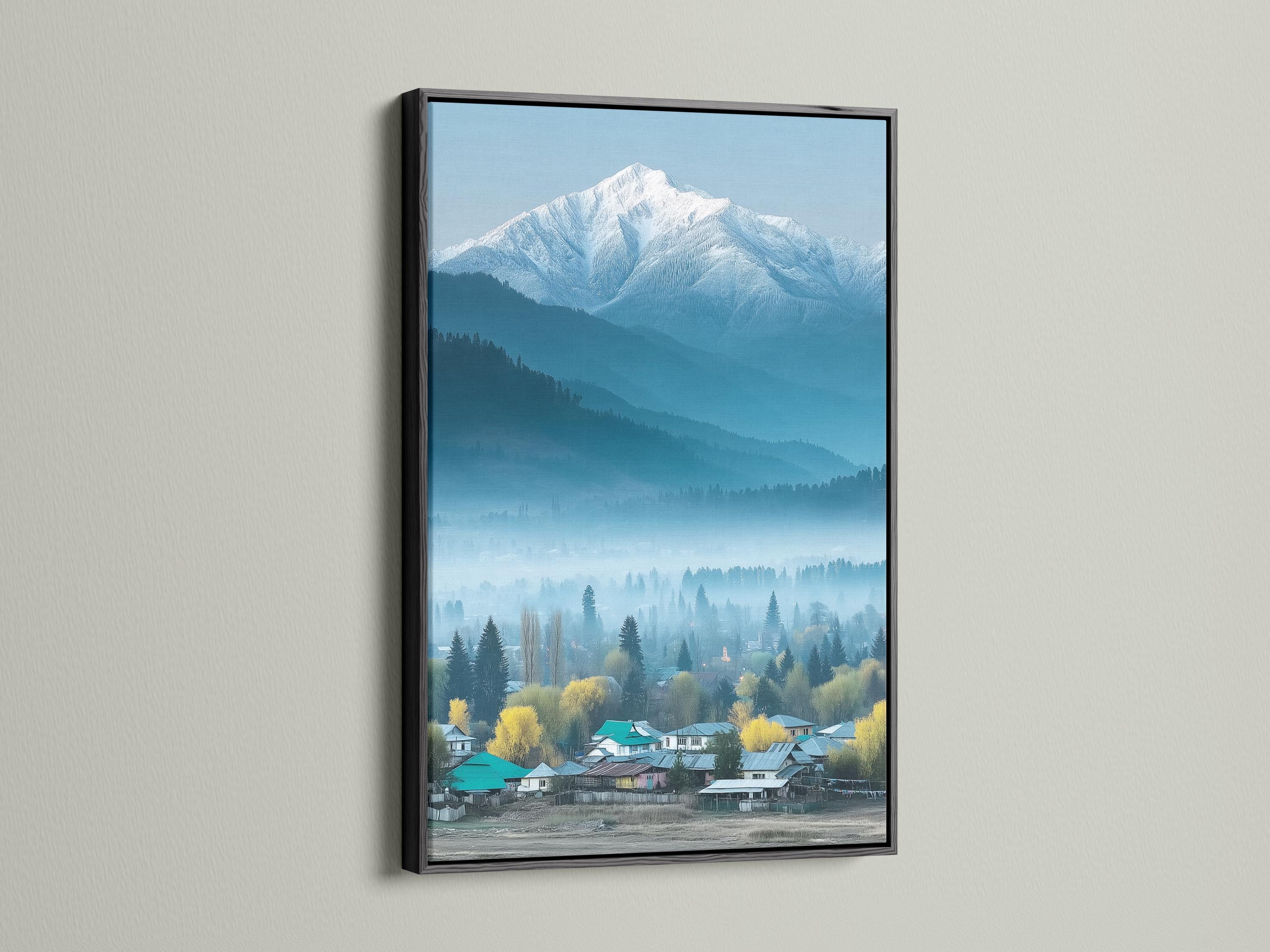 Misty snowy mountain landscape with evergreen trees and a village in teal and blue tones detail view