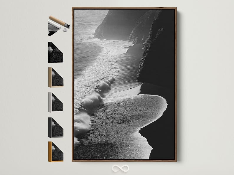 A monochrome seascape shows foamy wave textures breaking along a shoreline, with dark cliff-like shapes framing the scene
