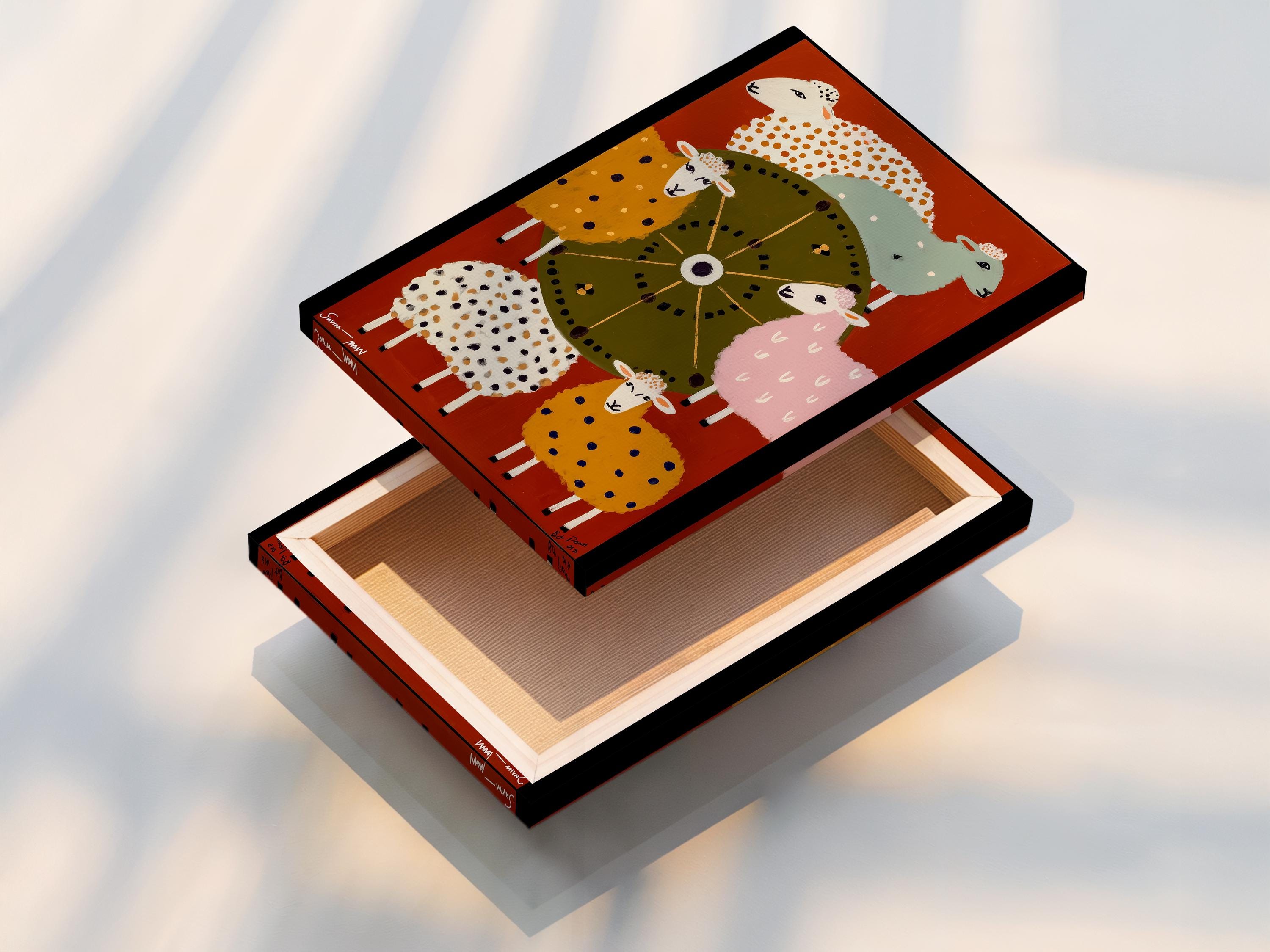 Colourful folk-style sheep illustration with a central wheel motif on a warm orange background detail view