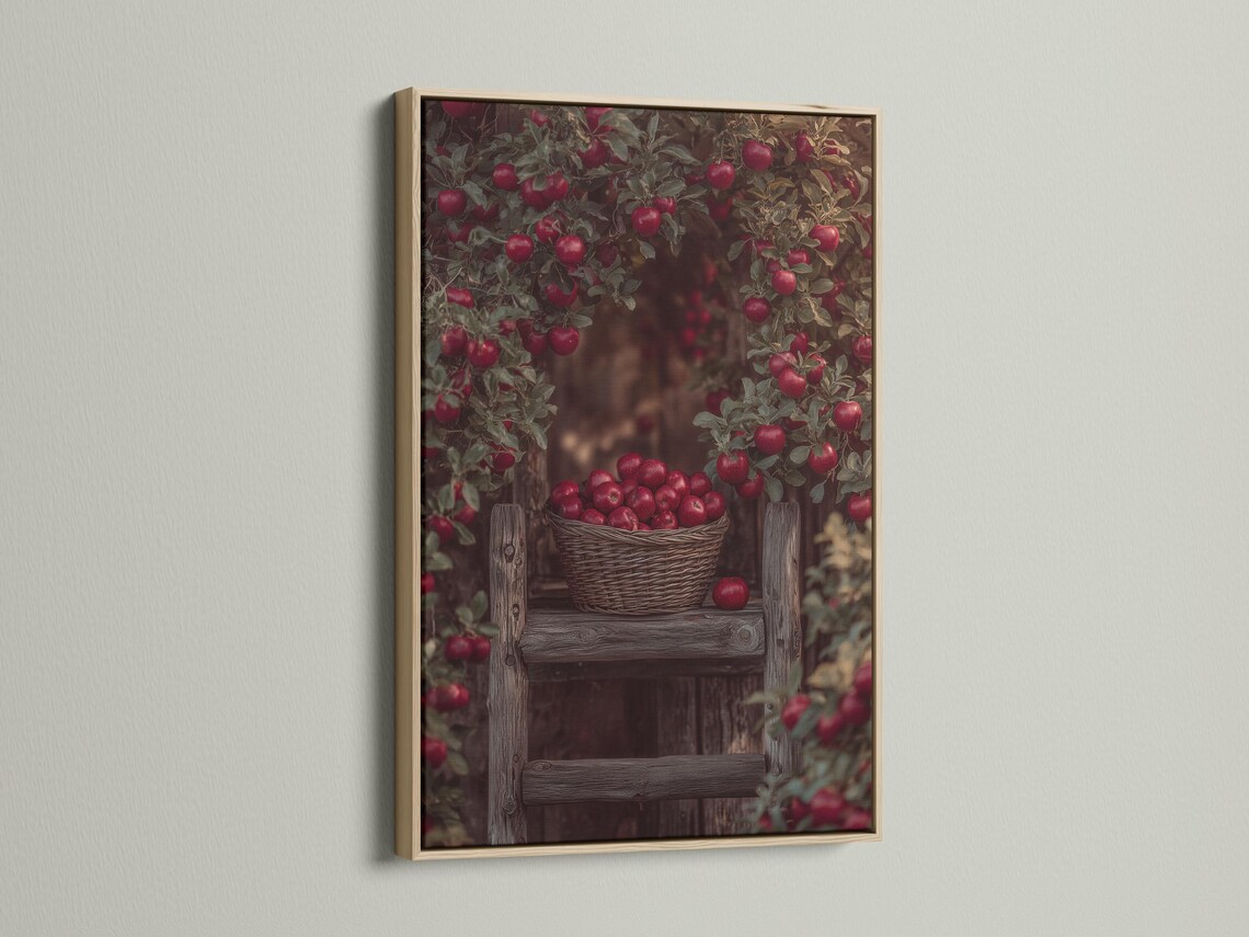 Portrait artwork showing a wicker basket of red apples with leafy branches and a rustic orchard background detail view
