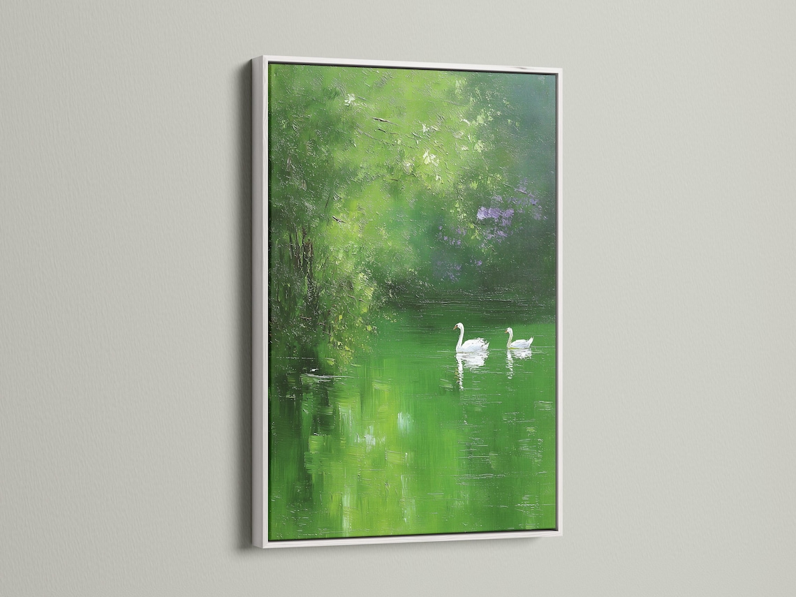 Green landscape artwork with two white swans floating on dark green water detail view