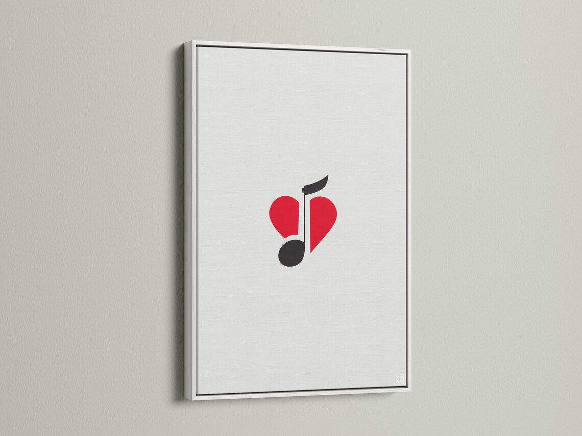 Wall mockup of minimalist red heart and black music note artwork