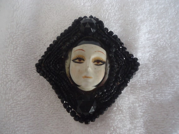 Painted Porcelain Face Brooch, Black Beaded Frame 5/8