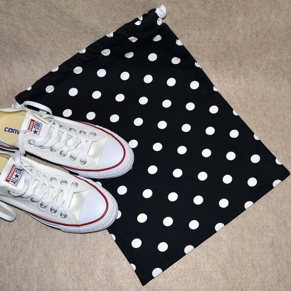 black shoes with white polka dots