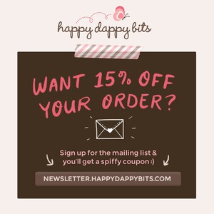 May include: A brown chalkboard with pink text that says "WANT 15% OFF YOUR ORDER?" and a white envelope with a pink heart. The text below the envelope says "Sign up for the mailing list & you'll get a spiffy coupon :)" and "NEWSLETTER.HAPPYDAPPYBITS.COM".