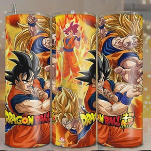 May include: A cylindrical tumbler featuring a vibrant Dragon Ball Super graphic print. The design displays multiple illustrations of the character Goku in various forms, including Super Saiyan and Super Saiyan God, set against a fiery orange background.
