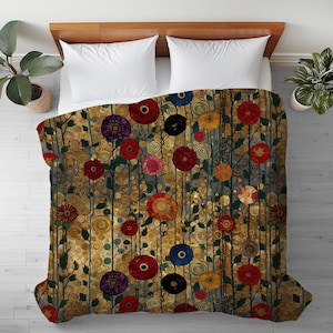 May include: A rectangular bed comforter featuring a dense, repeating pattern of vibrant red, blue, purple, and yellow flowers set against a textured, golden-brown background filled with intricate, swirling circular motifs and thin vertical lines.