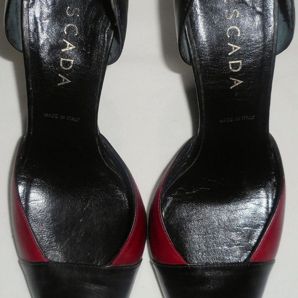 spectator pumps black white