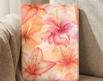 May include: A rectangular tablet case featuring a watercolor-style print of large hibiscus and lily flowers in shades of coral, peach, pink, and soft orange. The floral pattern covers the entire front surface with visible yellow stamen details.