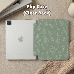 May include: A tablet flip case with a clear back and a sage green front cover featuring a white line-art botanical pattern of various wildflowers and leaves. The text Flip Case (Clear Back) is visible above the device, which has a camera lens.