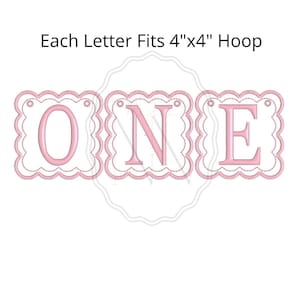 May include: Pink embroidered banner spelling "ONE" with scalloped edges. The text "Each Letter Fits 4"x4" Hoop" is above the banner. The banner is designed for a first birthday celebration.