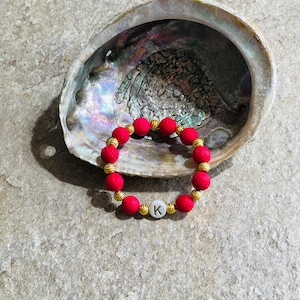 Lava Bead Initial Bracelet. Handcrafted on Maui. Red and Gold