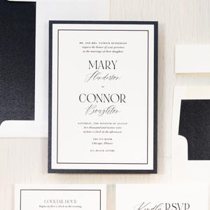 May include: A rectangular wedding invitation card with a thick black border on a white background. The text reads: Mr. and Mrs. Patrick Henderson request the honor of your presence at the marriage of their daughter Mary Henderson to Connor Boughton.