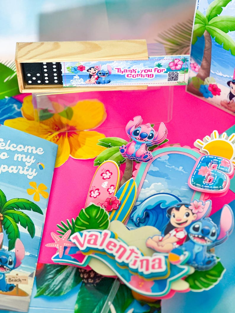 May include: A party display with a wooden domino set and themed decorations. The scene includes a pink backdrop, cartoon characters, surfboards, and the name "Valentina". The text "Thank you for coming" is also visible.