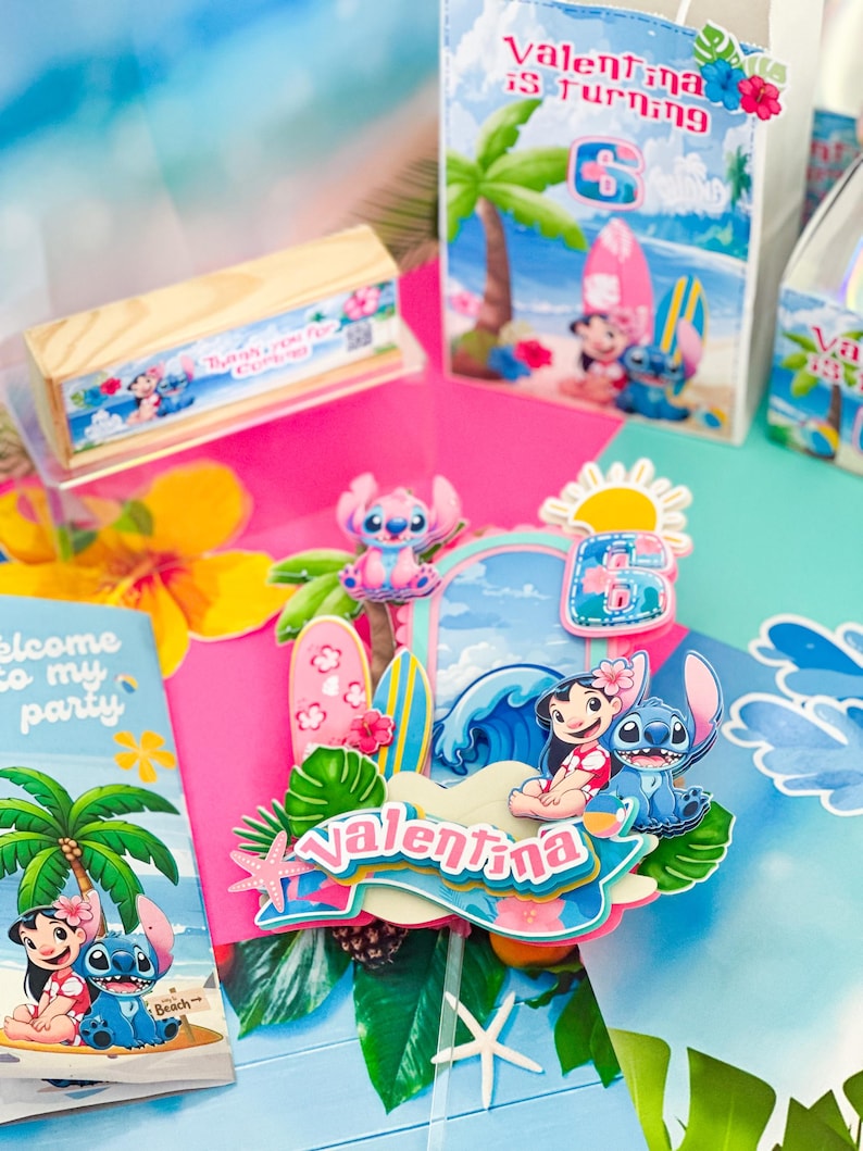 May include: A vibrant party set with Lilo and Stitch designs. The set includes a cake topper with the name "Valentina", gift bags, and a wooden box. The theme is a beach party, with surfboards and palm trees, perfect for a child's birthday celebration.