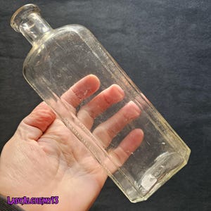Vintage Antique Medicine Old Bottle Clear Glass Embossed Wampole Collectible Medical