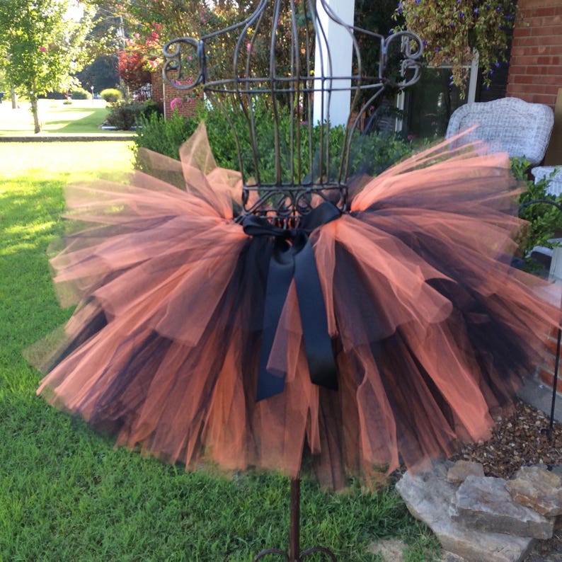 adult orange and black tutu