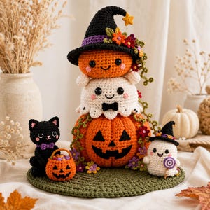 May include: A crochet Halloween display featuring a stacked pumpkin and ghost wearing a black witch hat with flowers, a black cat with a purple bow, a small pumpkin bucket, and a ghost holding a purple lollipop, all on a green circular mat.