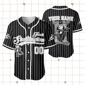 May include: A black and white pinstripe baseball jersey with the text "Jack Skellington" and the number "00". The jersey has white detailing and a Jack Skellington graphic on the front and back. The back of the jersey has the text "YOUR NAME".