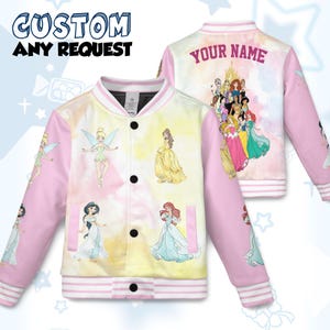 May include: A custom-designed bomber jacket with a colorful tie-dye pattern. The front features princess illustrations and the text "CUSTOM ANY REQUEST". The back displays princess characters and the text "YOUR NAME". Pink sleeves and a white collar complete the design.