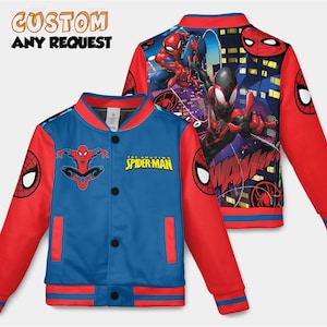 May include: A blue and red Spider-Man bomber jacket. The front of the jacket features a Spider-Man graphic and the text "The Amazing Spider-Man". The back of the jacket has a cityscape and Spider-Man characters. Text at the top says "CUSTOM ANY REQUEST".