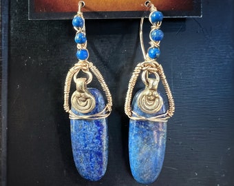 Lapis Lazuli wire wrapped in 14k gold filled with brass pendants. Earrings handmade with love by Gypsy Lotus