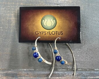 Lapis Lazuli wire wrapped on 14k Gold filled hoops. Earrings handmade with love by Gypsy Lotus