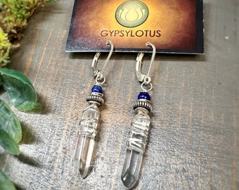 Quartz points wire wrapped in hammered sterling silver with Lapis Lazuli on lever back ear wires. Earrings handmade with love by Gypsy Lotus