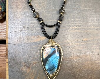 Bright Labradorite pendant wire wrapped in 14k Gold filled on black leather. Necklace handmade with love by Gypsy Lotus